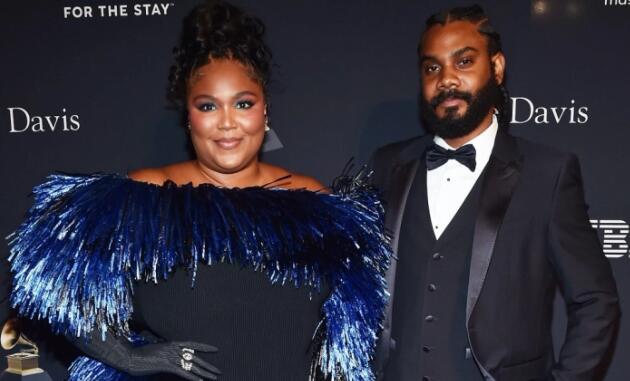 Lizzo Glows in Fringed Alexander McQueen Dress and Boots with Boyfriend Myke Wright at Pre-Grammy Gala 2023