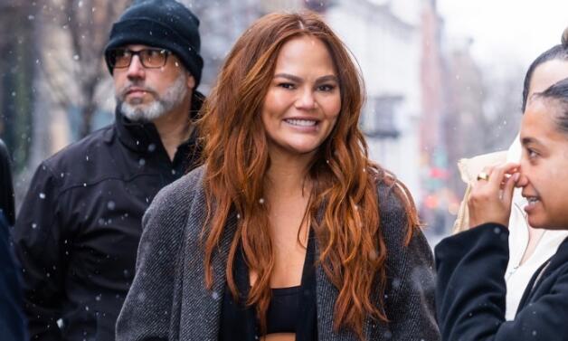 Chrissy Teigen Elevates All-Black Style With Bralette Top & Pointy Boots