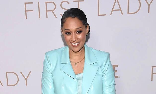 Tia Mowry Styles Tiny Boy Shorts With Leather Jacket & Bedazzled Boots