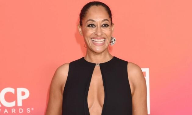 Tracee Ellis Ross Embraces Lux Leather in Forest Green Pants & Bottega Veneta Puddle Boots