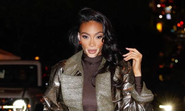 Winnie Harlow Elevates Trench Coat With Leather Knee-High Boots & Bodysuit