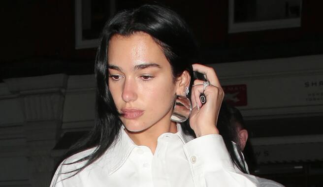 Dua Lipa Models Ethereal Look in Sheer White Bottega Veneta Boots