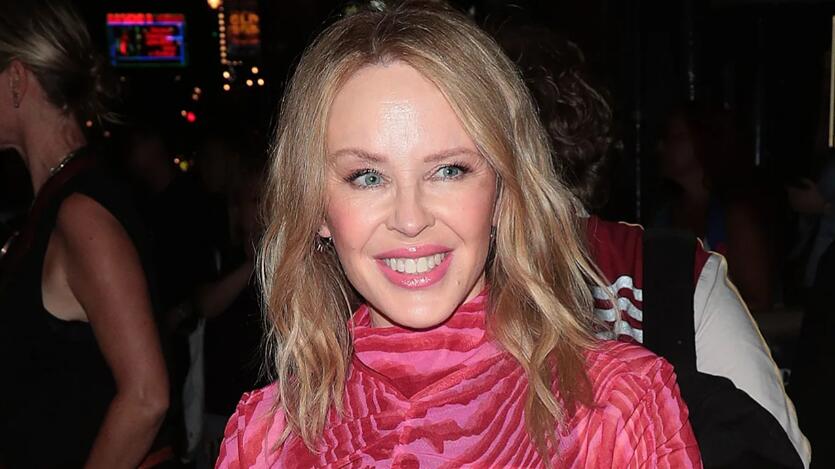 Kylie Minogue looks better than ever in striking sheer dress and thigh-high boots